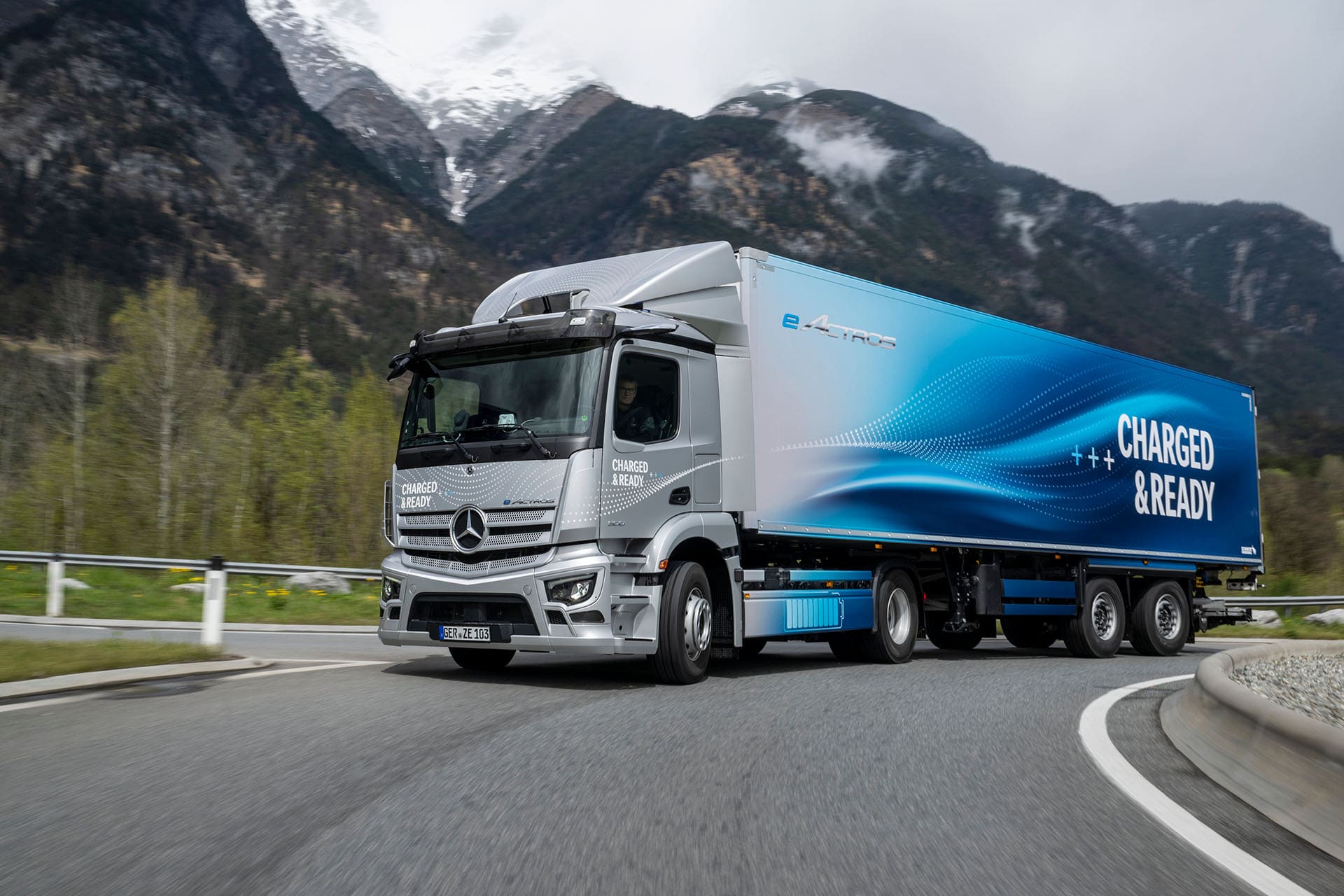 A sleek Mercedes-Benz e-tron electric truck parked, showcasing its modern design and eco-friendly features.