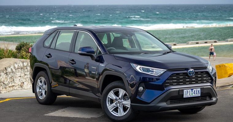 Toyota RAV4 Hybrid GX - The car is by the seaside