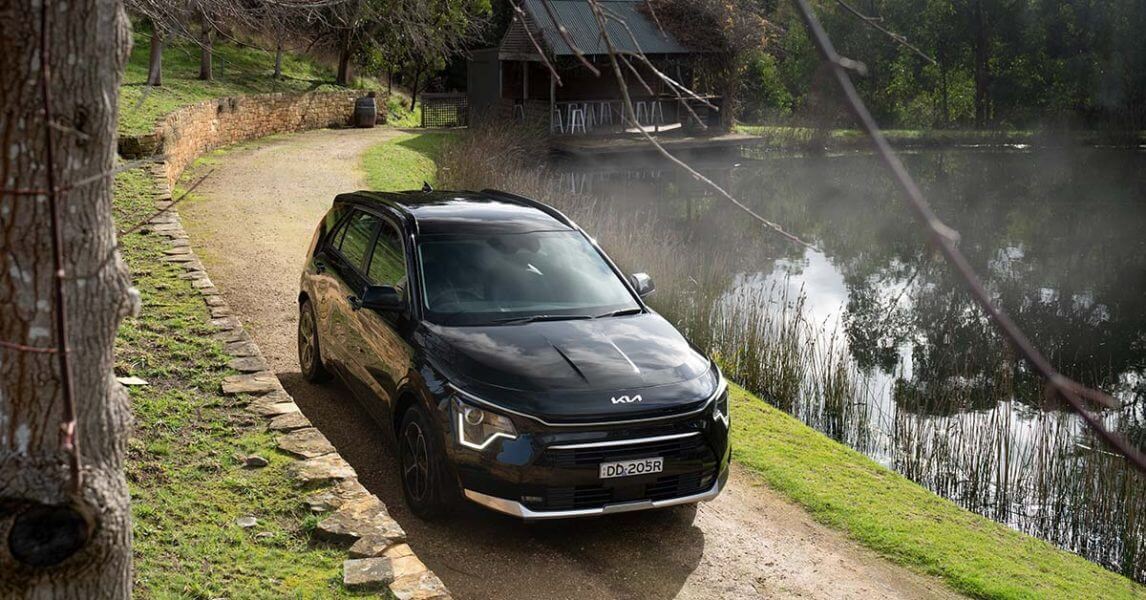 Kia Niro Electric Review- Black Kia by lake