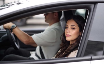 EV_Day_Couple_Driving_3-medium globalblog'