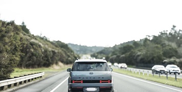 SUV driving on NZ motorway