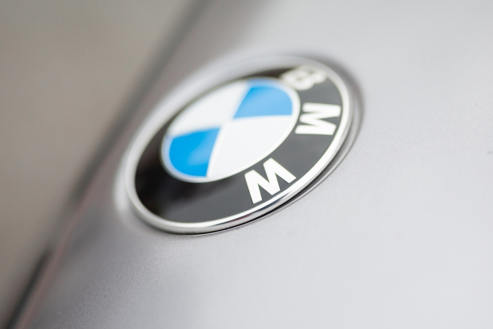 New EVS on the UK market bmw: Close-up of a BMW badge on the bonnet of an electric vehicle